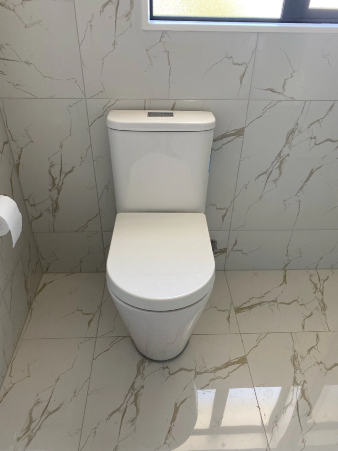 Toilet and cistern installed by Fernz Gas & Plumbing Specialist